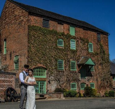 Bride and Groom outside The Mill