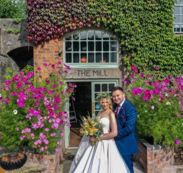 Bride and Groom outside The Mill