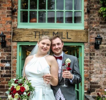 Bride and Groom outside The Mill