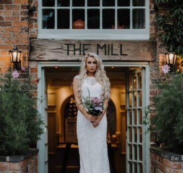 Bride in front of The Mill